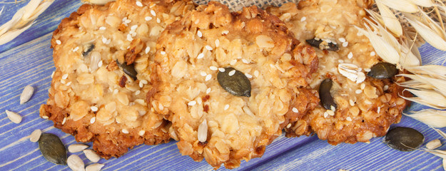 Oatmeal cookies on boards, healthy dessert concept
