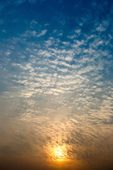 Colorful dramatic sky with cloud at sunset.Sky with sun background