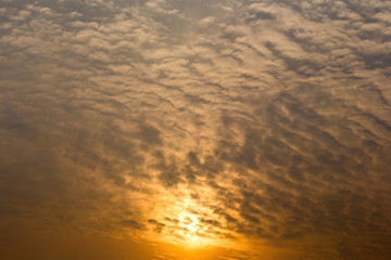 Colorful dramatic sky with cloud at sunset.Sky with sun background