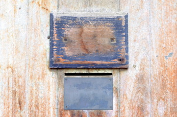 Wood Plate on Wood Door Background.