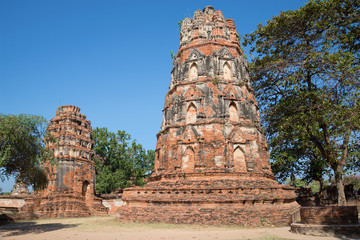 Ancient prangs of Buddhist temple Wat Mahathat on a sunny day. Ayutthaya, Thailand