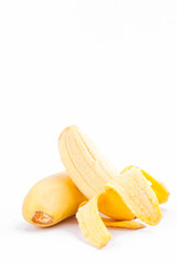 half peeled Lady Finger banana or golden banana   on white background healthy Pisang Mas Banana fruit food isolated

