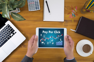 Fototapeta na wymiar PPC - Pay Per Click concept Businessman working concept