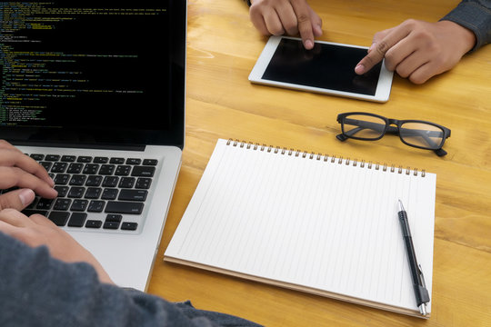 "Developer Team Working Laptop Computer Mobile Application Softwareand Web Design Online Technology Content , Web script , laptop display."
