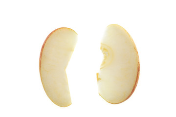 Red apple slices isolated on white background.