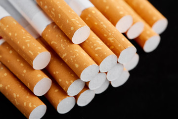 cigarette close up isolated on blak background. Drug addiction. Tobacco smoking. cancer. Nicotine. Bad habit.