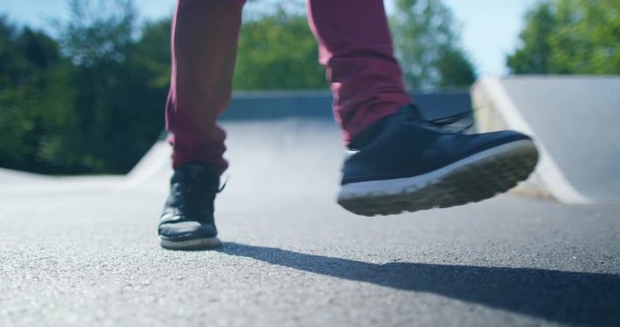  Low Angle View The Feet Of Young Urban Street Dancer Dancing At Skate Park