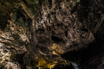 Dark rock texture close up on a cave