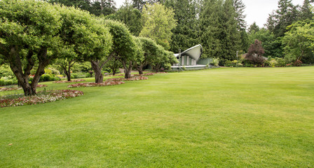 Fototapeta na wymiar Large Green Lawn with Stage