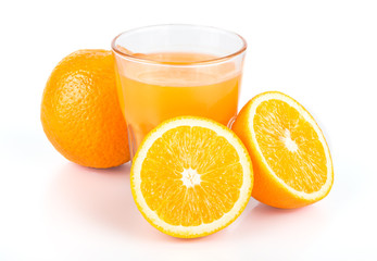 Orange juice. Isolated drink. A glass of orange juice and pieces of orange fruit isolated on white background. Citrus. Diet. Vitamins. Healthy food.