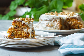 Carrot cake with walnuts, dessert in the garden, selective focus