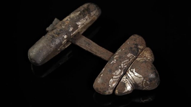 Original ancient Viking sword hilt from Viking era. Hilt with exceptional golden engravings.