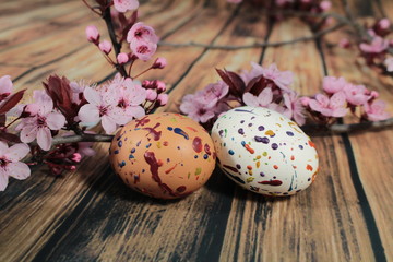 Obraz na płótnie Canvas Painted Easter egg with cherry branch
