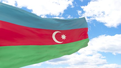 Waving flag of Azerbaijan Republic on the blue cloudy sky.