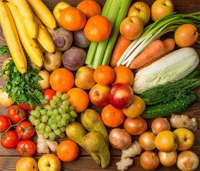 Group Fruits and vegetables on a wooden rustic table