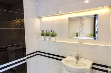 Modern bathroom interior in beige color
