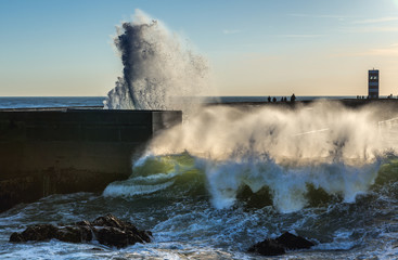 Big waves smashes on breakwater in Porto, Portugal