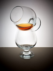 Glass whisky brandy cognac rum background light gradient luster