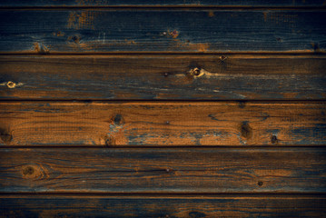 Artificially aged and painted boards, wood. Background, textured tree close-up. Knotted, withered wooden boards