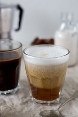 Hot latte and black coffee on white background. Morning concept