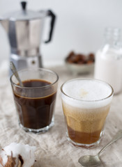 Hot latte and black coffee on white background. Morning concept