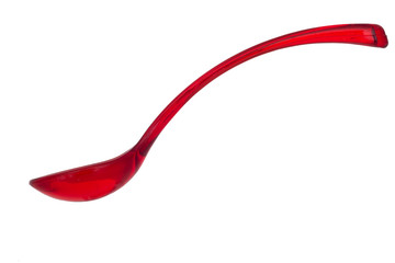 Beautiful red plastic spoon isolated on white background.