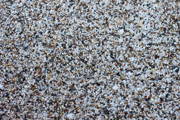 Small gray stone background, horizontal view.