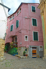 Fototapeta na wymiar Bright house in the village Boscomare, Liguria