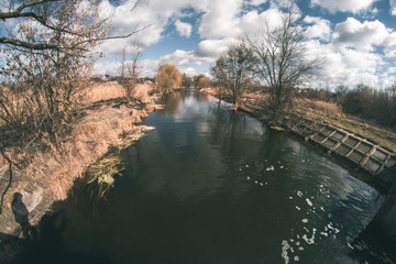 Spring landscape near the fisheye river.