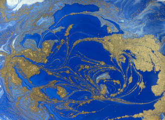 Blue and golden liquid texture. Watercolor hand drawn marbling illustration. Ink marble background.