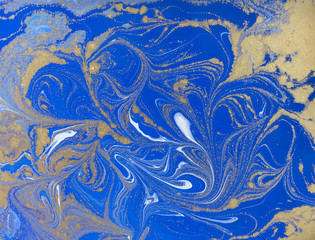 Blue and golden liquid texture. Watercolor hand drawn marbling illustration. Ink marble background.