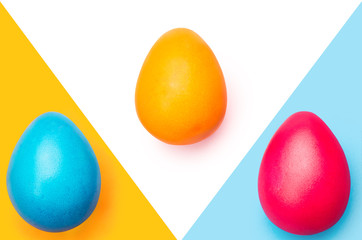 colored easter eggs, three color background abstraction