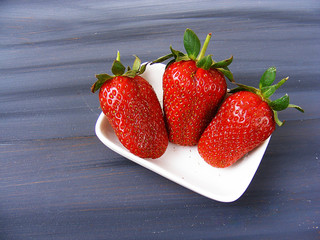 Strawberries on the rustic floor, strawberries in the plate, lovely beautiful strawberry pictures,
