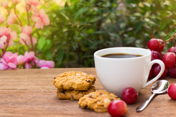 black coffee with cookie