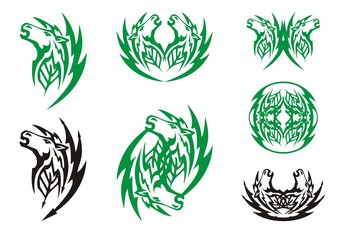 Fototapeta premium Peaked symbols of the horse head with a leaf inside. Tribal furious horse head in black and green options with a leaf inside, double horse symbols