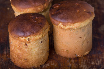 Easter cake bread of home baking on old wooden cutting board