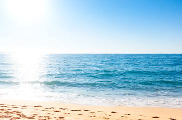 Sand coastline against the sun