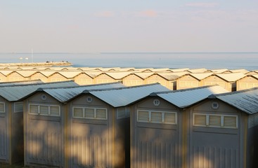 Beach cabins on the famous Lido beach in Venice, in the low season in April. Lido di Venezia, Italy, europe.
