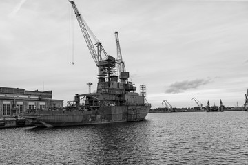 Ship and port cranes at repair area.