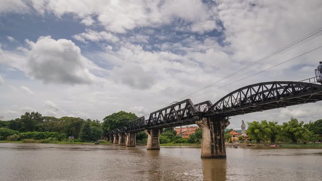Railway bridge cross river Kwai timelapse at Kanchanaburi, Thailand, 4K Time Lapse