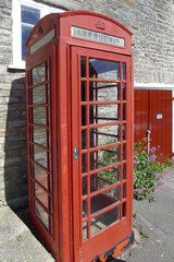 red old telephone box in England Cornwall