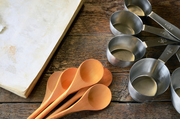 Wooden Mixing Spoons and Old Cookbook