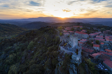 Fototapeta na wymiar Aerial view of the Sortelha Village and Castle in Portugal at sunset; Concept for travel in Portugal