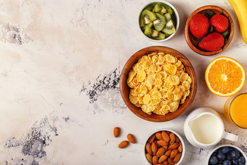 Healthy breakfast - bowl of corn flakes, berries and fruit © tbralnina