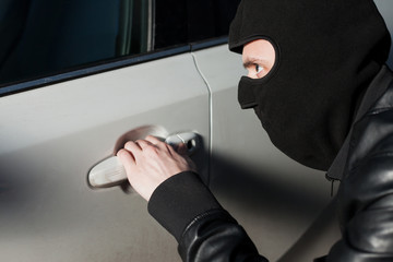Carjacking danger, car insurance concept