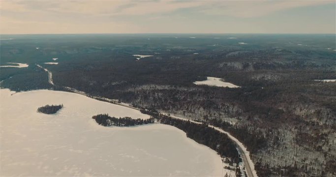 4K Aerial Video Sequence of Algonquin Provincial Park , Canada - The frozen lakes at winter