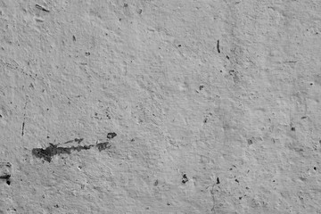 Wall fragment with scratches and cracks