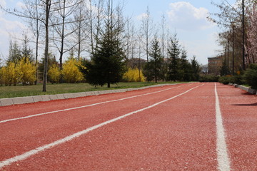 Red running track in city