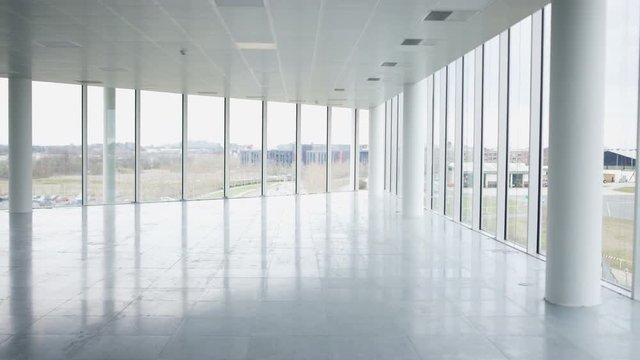  Interior view of large empty modern property with panoramic view. No people.