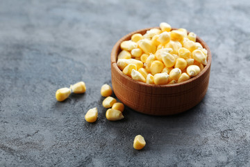 Sweet corn on a grey wooden table